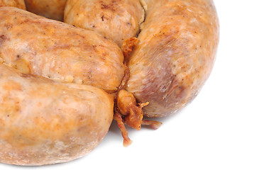 Image showing sausage from the pork stuffing isolated on a white background 