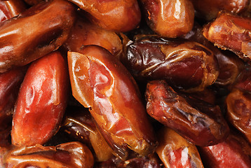 Image showing Fine dried date fruits macro background 