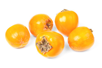 Image showing Some persimmon fruit slice on white background 