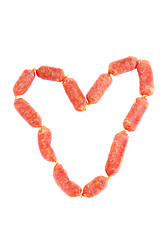 Image showing heart shape salami sausage  on  white background  
