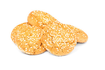 Image showing oatmeal cookies with sesame seeds isolated on  white