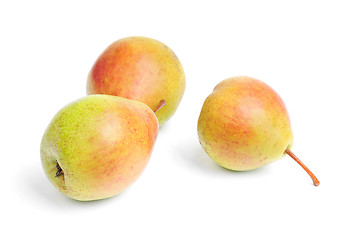 Image showing some  ripe pears isolated on white background 