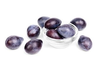 Image showing Some fresh blue plums on the white background