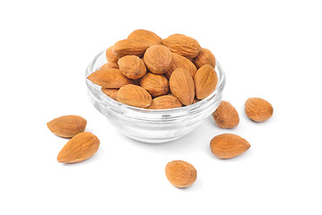 Image showing Dried almonds on glass bowl isolated on a white background 