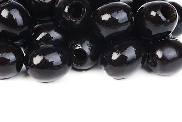 Image showing Black pitted olives isolated on white 