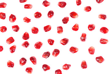 Image showing garnet seeds isolated on white background 