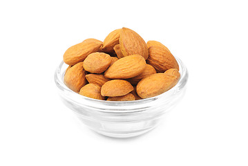 Image showing Dried almonds on glass bowl isolated on a white background 