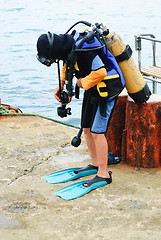 Image showing Little scuba diver , before diving into sea 