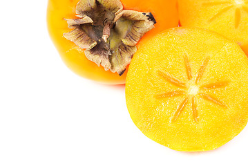 Image showing Some persimmon fruit slice on white background 