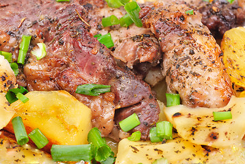 Image showing Barbecue meat with potato close-up as food background 