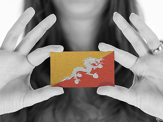 Image showing Woman showing a business card