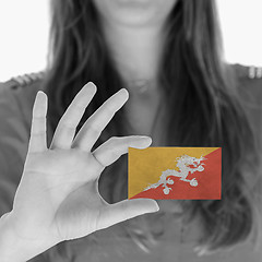 Image showing Woman showing a business card