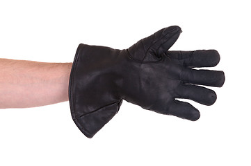 Image showing Mans hand in very old black leather glove