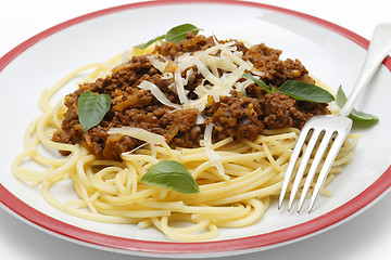 Image showing Spaghetti bolognese with fork