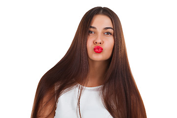 Image showing Beautiful young woman kiss. Red lips