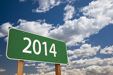 Image showing 2014 Green Road Sign Over Clouds