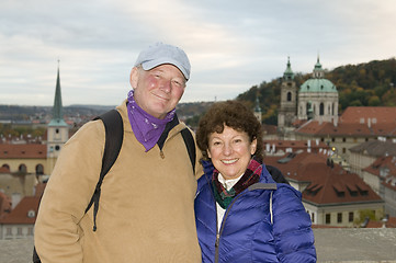 Image showing middle age senior smiling man woman tourist couple Castle Distri