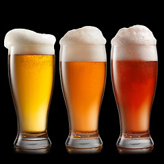 Image showing Different beer in glasses isolated on white background