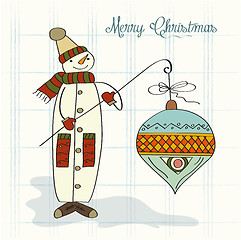 Image showing snowman with big Christmas ball