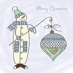 Image showing snowman with big Christmas ball