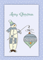 Image showing snowman with big Christmas ball