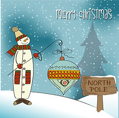 Image showing snowman with big Christmas ball