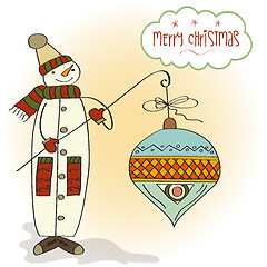 Image showing snowman with big Christmas ball