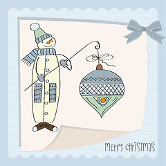 Image showing snowman with big Christmas ball