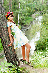 Image showing Attractive woman with flower wreath