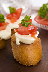 Image showing Bruschetta with mozarella and tomatoes