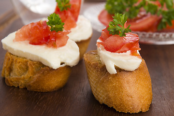 Image showing Bruschetta with mozarella and tomatoes