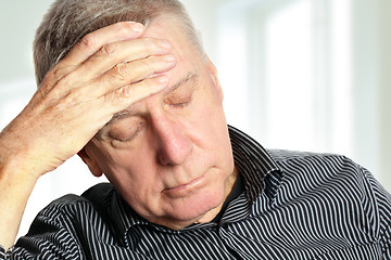 Image showing Senior man with a headache