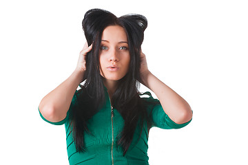 Image showing Young girl wearing green dress posing in studio