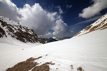 Image showing Hiker in snowy mountains