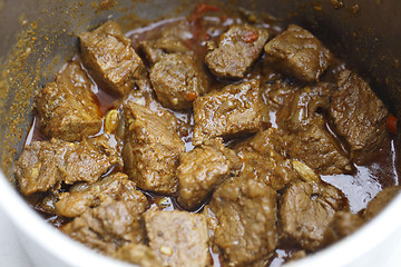 Image showing Beef madras curry cooking