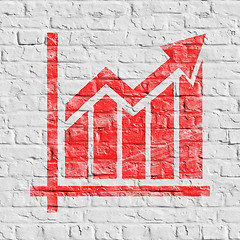 Image showing Red Growth Chart Icon on White Brick Wall.