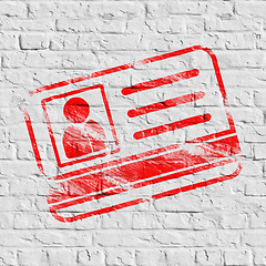 Image showing Red ID Card Icon on White Brick Wall.