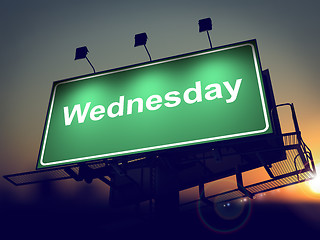 Image showing Wednesday - Billboard on the Sunrise Background.