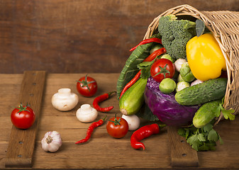 Image showing Healthy Organic Vegetables on a Wooden Background