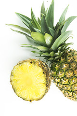 Image showing Ripe pineapple with slices