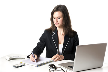 Image showing Businesswoman writing something