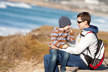 Image showing family hiking at the beach