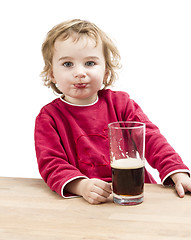 Image showing young girl drinking beer