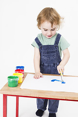 Image showing young girl working with paint