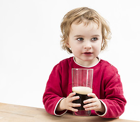 Image showing young girl drinking beer