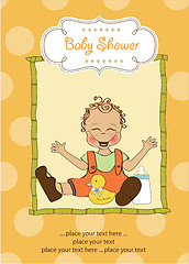 Image showing baby boy playing with his duck toy, welcome baby card