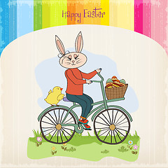 Image showing Easter bunny with a basket of Easter eggs