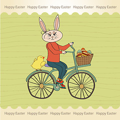 Image showing Easter bunny with a basket of Easter eggs