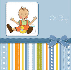 Image showing baby boy playing with his duck toy, welcome baby card