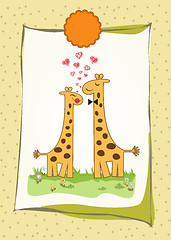 Image showing Funny giraffe couple in love